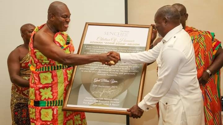 Azumah Nelson being presented with the citation by  Odeneho Kwafo Akoto III, Paramount Chief of the Akwamu Traditional Area